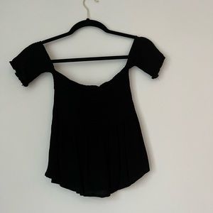 Off shoulder black peplum top